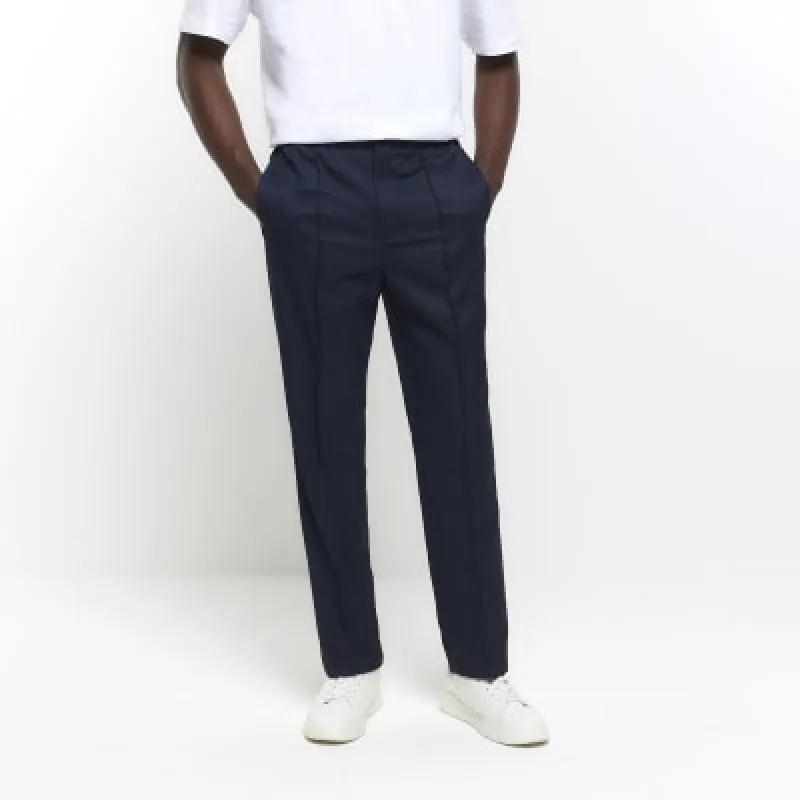 Navy slim fit smart joggers sold by River Island