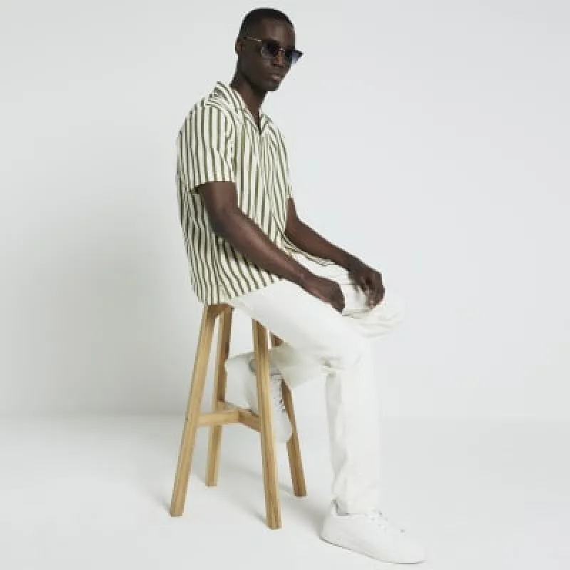 Khaki regular fit seersucker stripe shirt sold by River Island