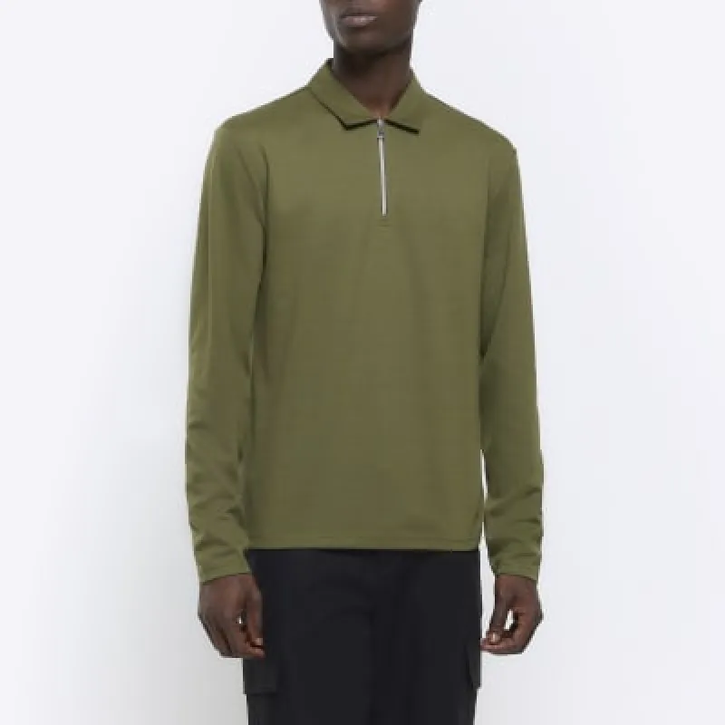 Green regular fit half zip polo sold by River Island