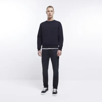 Black slim fit faded jeans sold by River Island