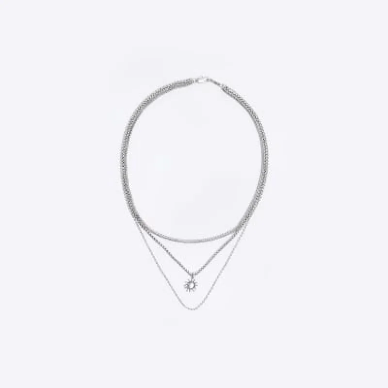 Silver colour multirow sun necklace sold by River Island