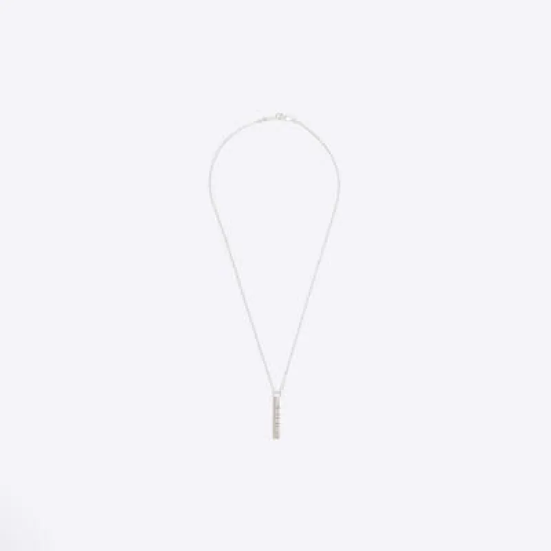 Silver plated bar pendant necklace sold by River Island