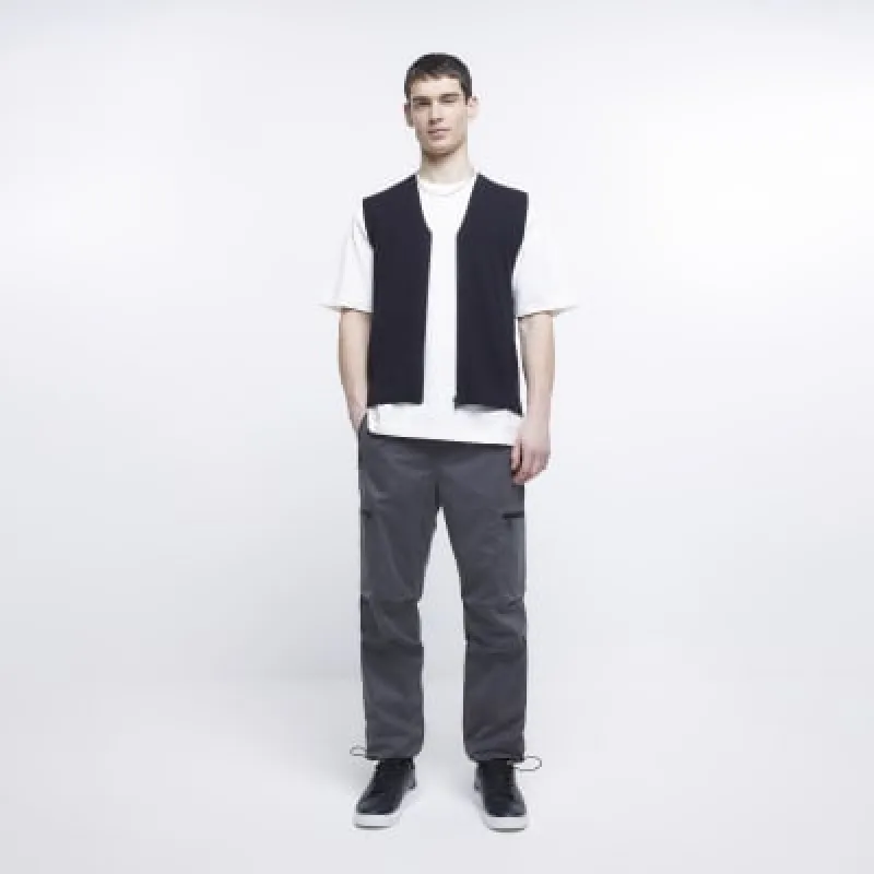 Grey regular fit zip pocket cargo trousers sold by River Island
