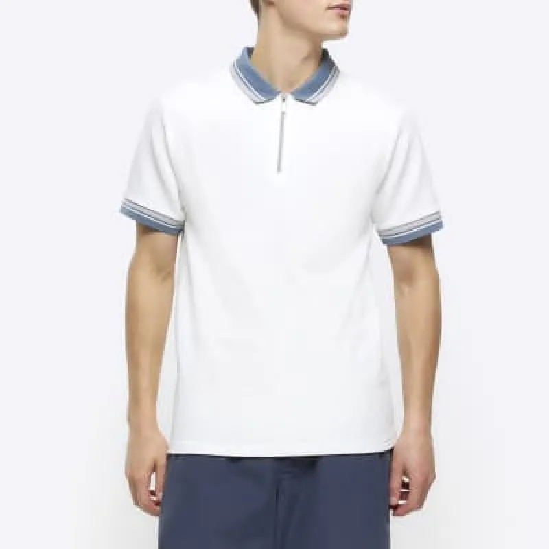 Beige slim fit taped half zip polo sold by River Island