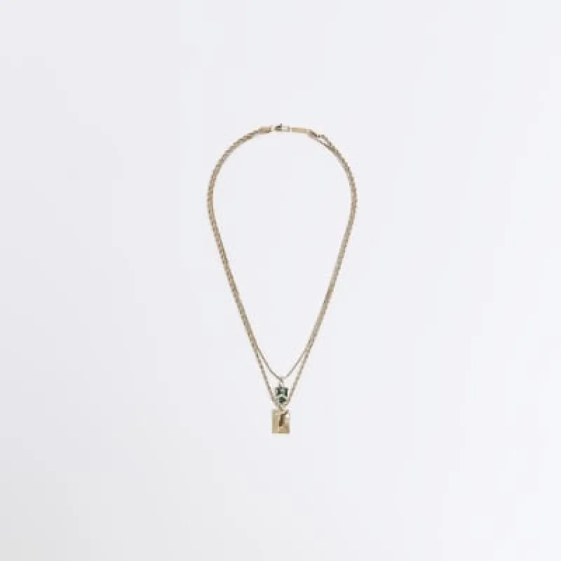 Gold colour shield and tag multirow necklace sold by River Island