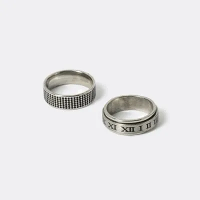 Silver colour stainless steel embossed rings sold by River Island