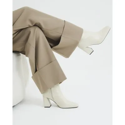 Cream Faux Leather Block Heeled Boots sold by River Island