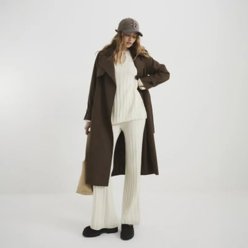 Cream Ribbed Flared Trousers sold by River Island