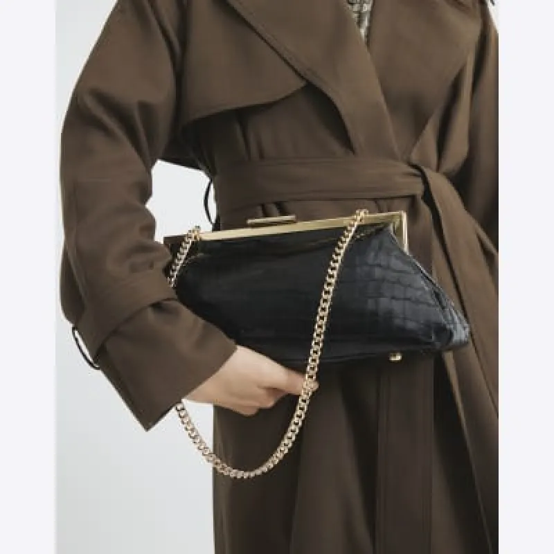Black Faux Leather Clutch Bag sold by River Island