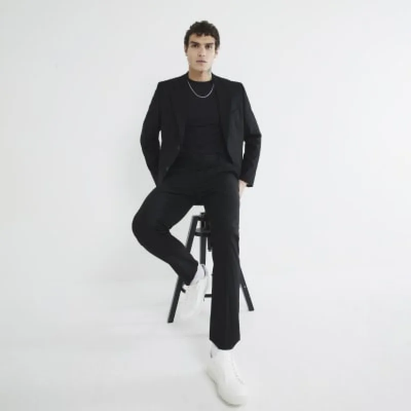 Black Stretch Skinny Fit Suit Trousers sold by River Island