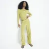 Green textured wide leg trousers sold by River Island
