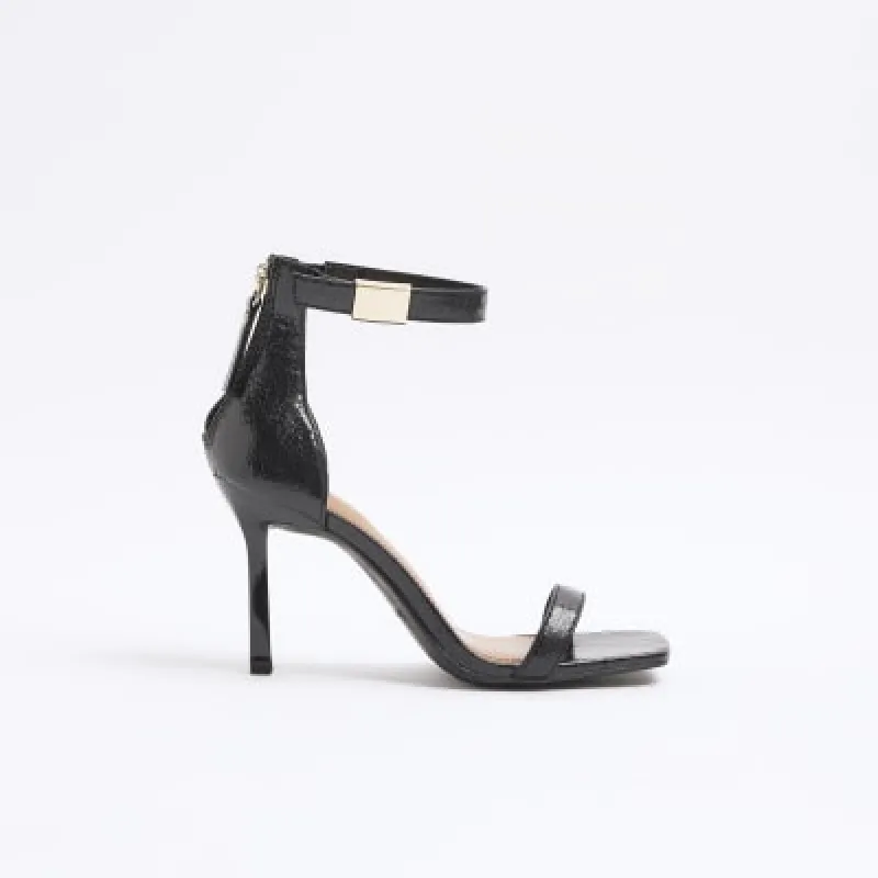 Black wide fit patent clasp strap sandals sold by River Island