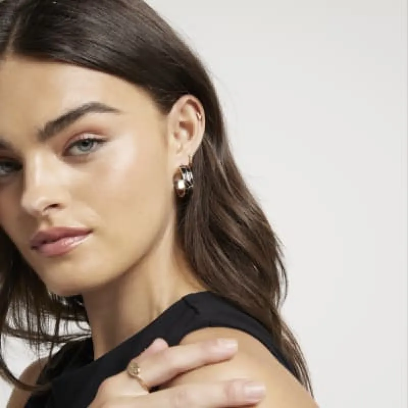 Black enamel hoop  earrings sold by River Island