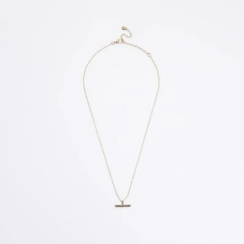 Gold February birth stone necklace sold by River Island