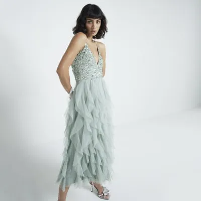 Green sequin ruffle swing midi dress sold by River Island