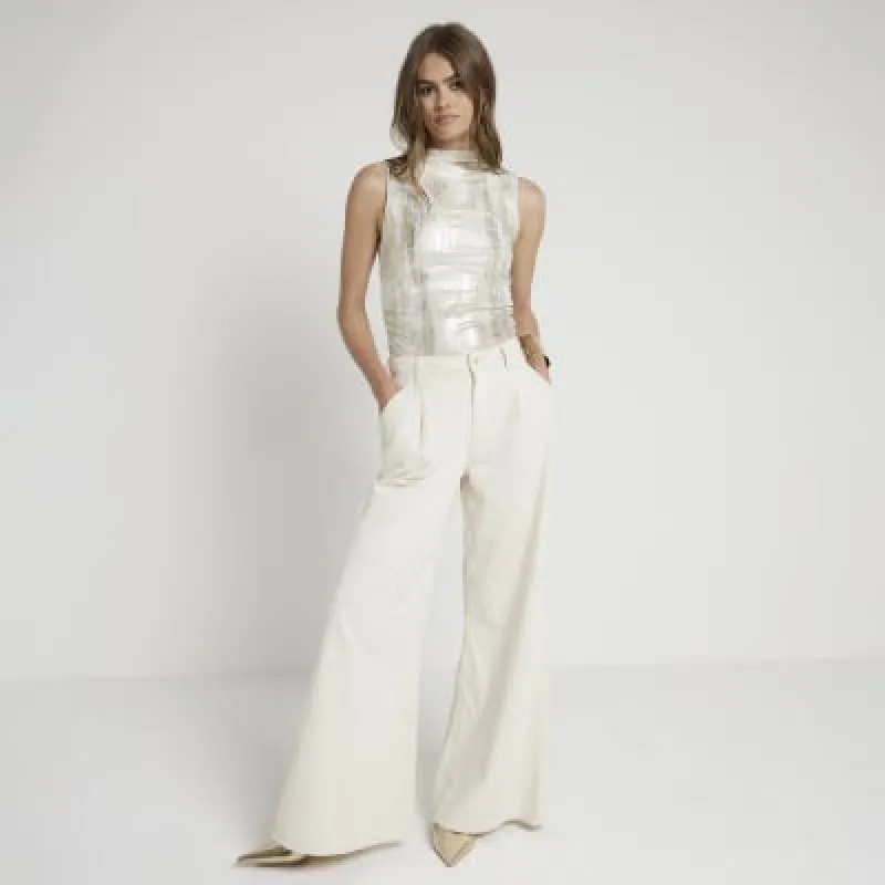 Gold foil high neck top sold by River Island