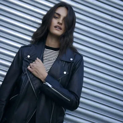 Black leather oversized biker jacket sold by River Island