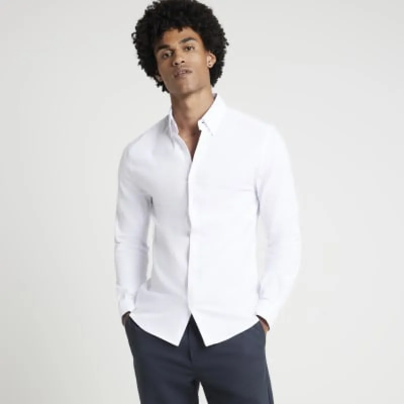 White muscle fit stretch textured shirt sold by River Island
