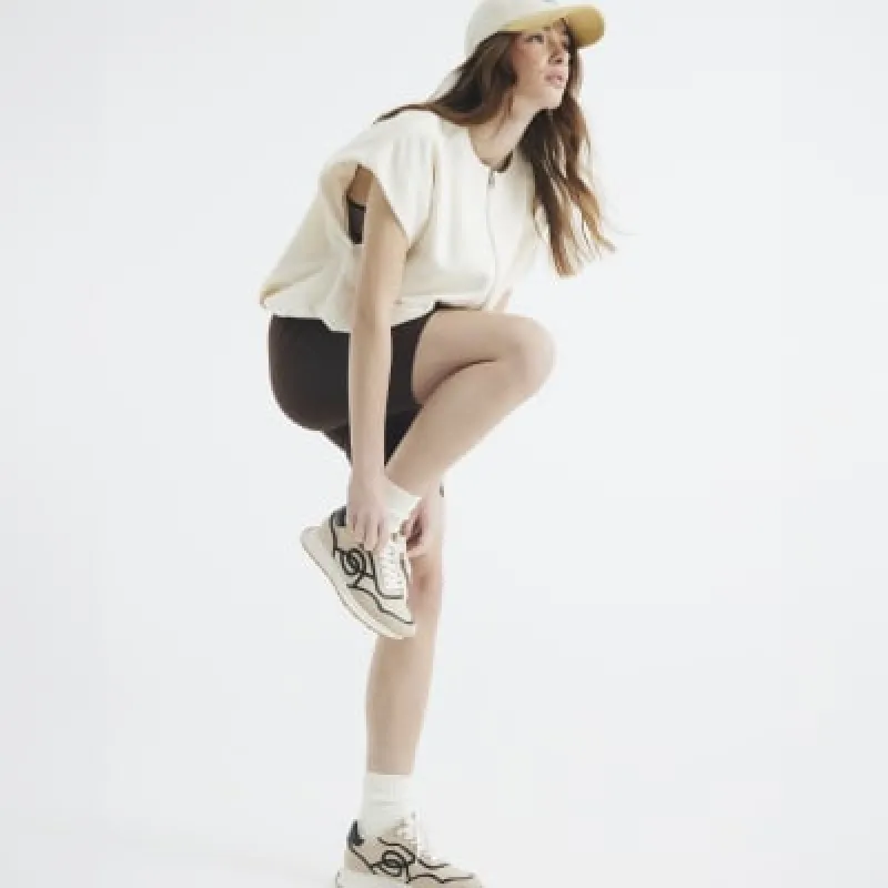 Cream Bubble Hem Gilet sold by River Island