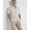 Beige slim fit chino shorts sold by River Island
