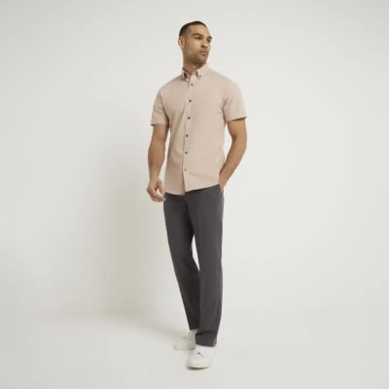 Pink muscle fit stretch textured shirt sold by River Island