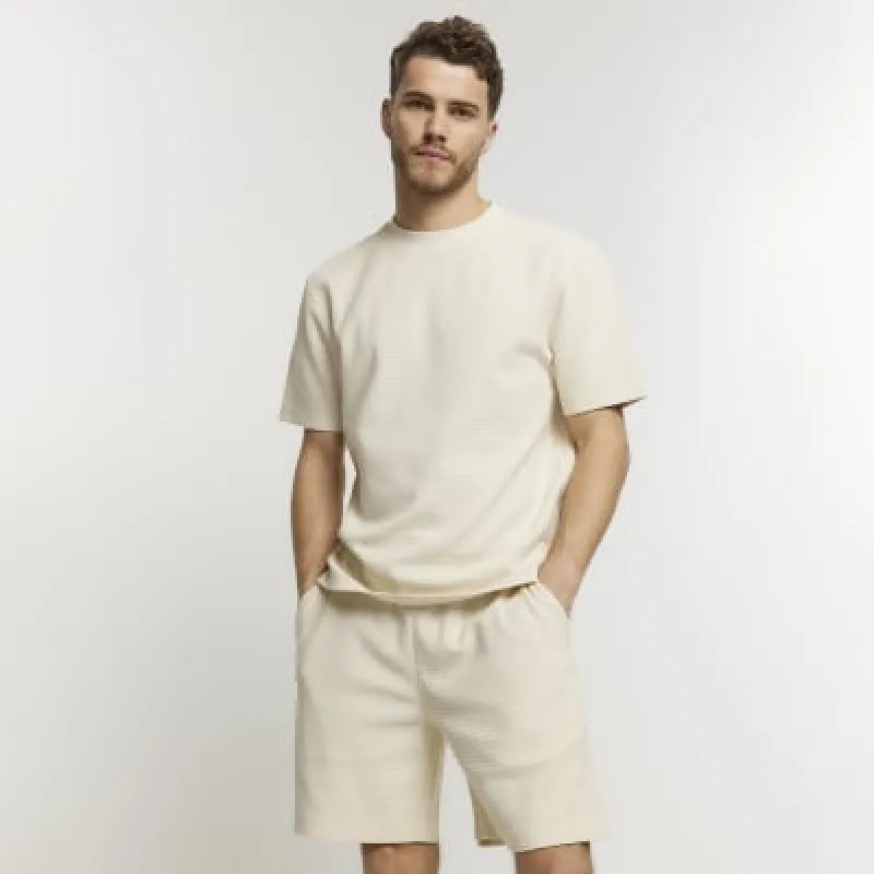 Stone regular fit waffle textured shorts sold by River Island