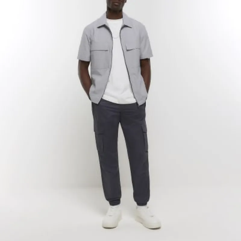 Dark grey regular fit cargo joggers sold by River Island