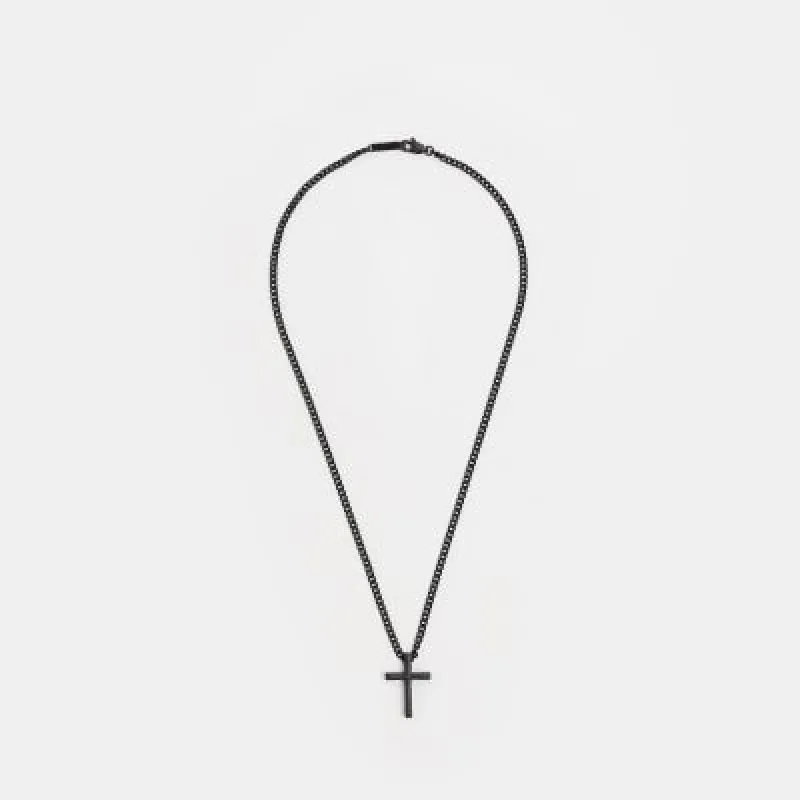 Silver colour cross necklace sold by River Island