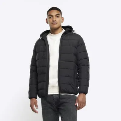 Black regular hooded quilted puffer jacket sold by River Island