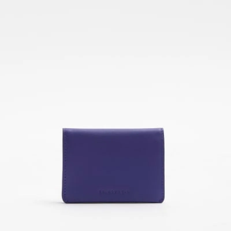 Purple leather bifold cardholder sold by River Island