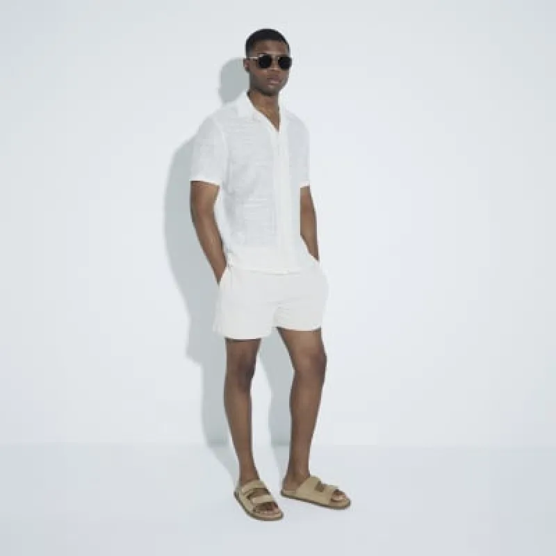 Beige Regular Fit Seersucker Swim Shorts sold by River Island
