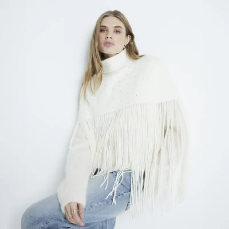 Cream Embellished Knitted Tassel Cape sold by River Island