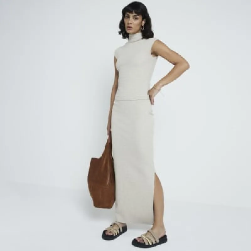 Beige ribbed maxi skirt sold by River Island