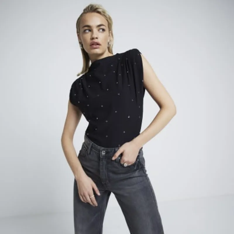 Black studded shoulder pad top sold by River Island