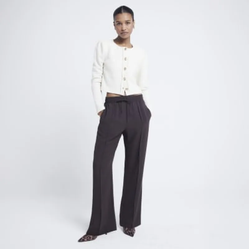 Brown tailored wide leg joggers sold by River Island