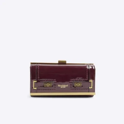 Red lock clip top purse sold by River Island