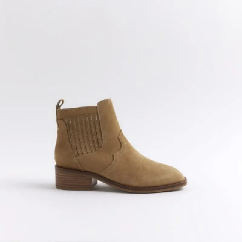 Beige suede block heeled boots sold by River Island