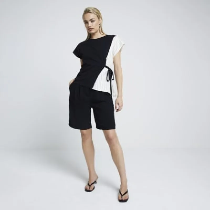 Black plisse hybrid belted top sold by River Island