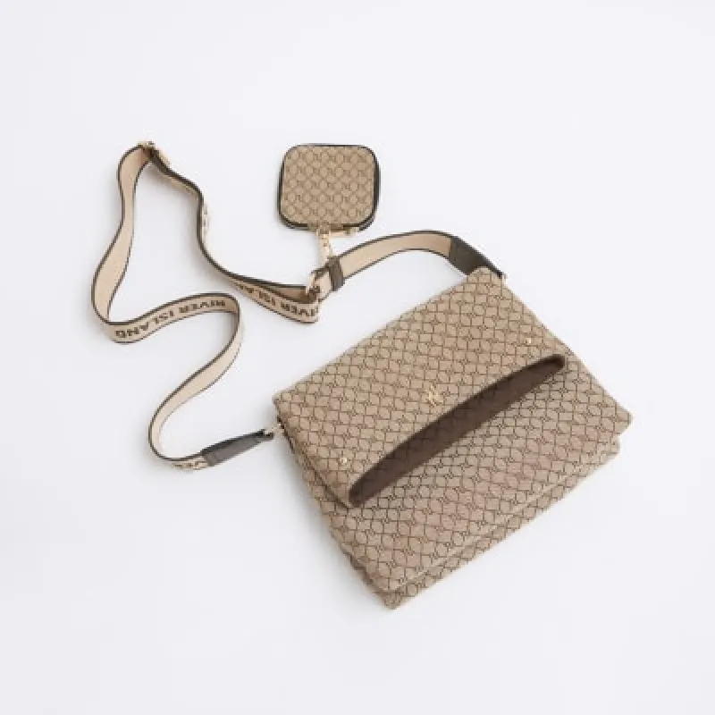 Brown RI monogram fold over cross body bag sold by River Island