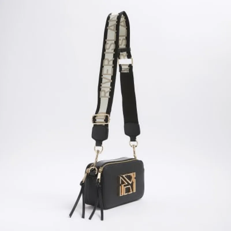 Black hardware camera cross body bag sold by River Island