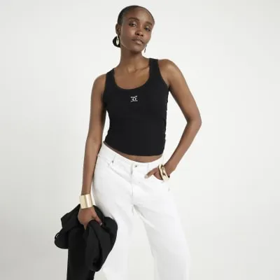 Black embroidered vest top sold by River Island