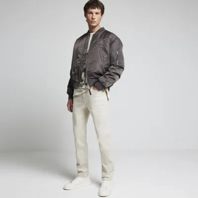 Beige slim fit jeans sold by River Island