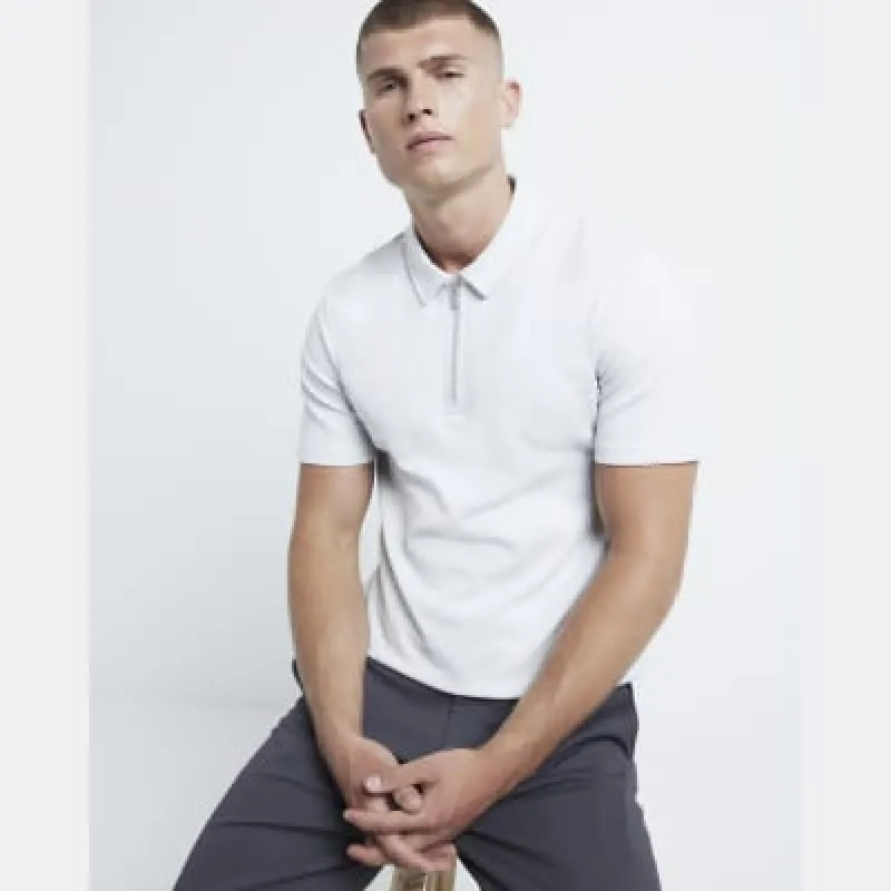 Grey slim fit stretch textured half zip polo sold by River Island