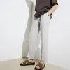 Brown suede cross over sandals sold by River Island