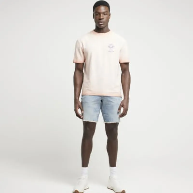 Washed orange regular fit graphic t-shirt sold by River Island