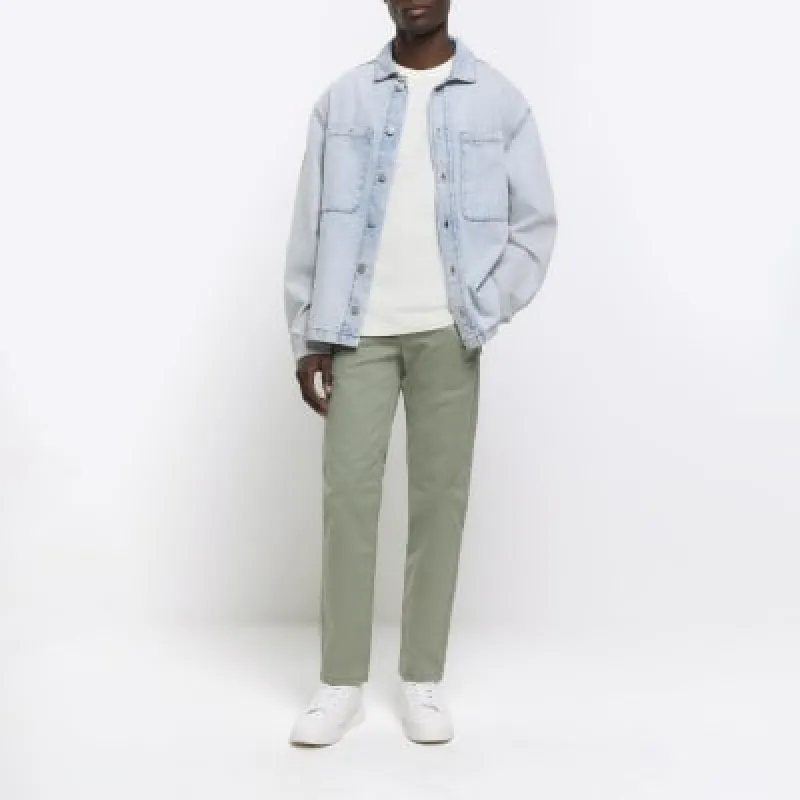 Green slim fit casual chino trousers sold by River Island