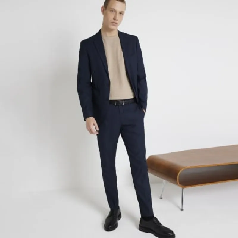Navy skinny fit twill suit trousers sold by River Island