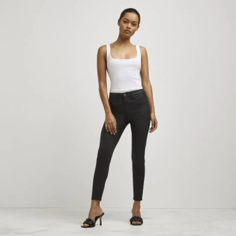 Petite black coated Molly skinny jeans sold by River Island
