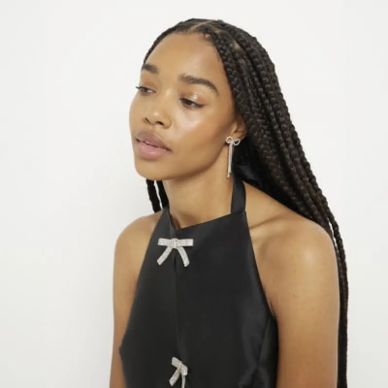 Silver Bow Chain Stud Earrings sold by River Island