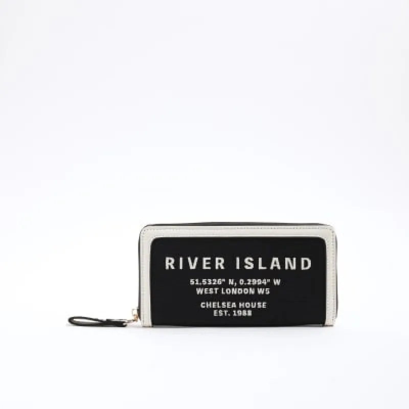 Black Canvas RI Zip Around Purse sold by River Island